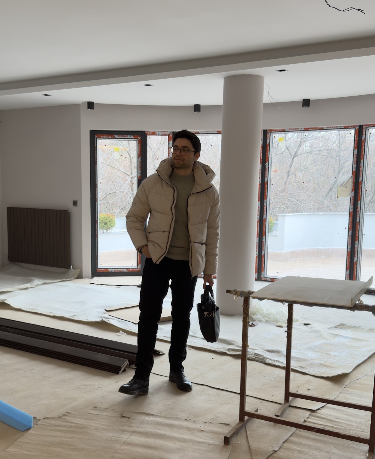 Founder of MHY Games standing inside an architectural project
